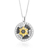Silver pendant with a gold Star